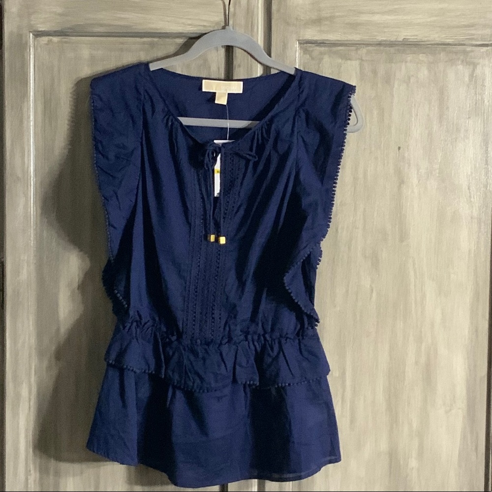 Ruffled sleeve navy blue tank top blouse.